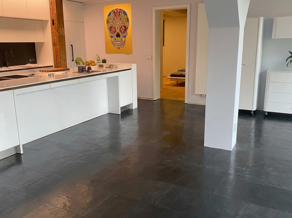 Kitchen with black leather flooring, CONTINENTAL collection.