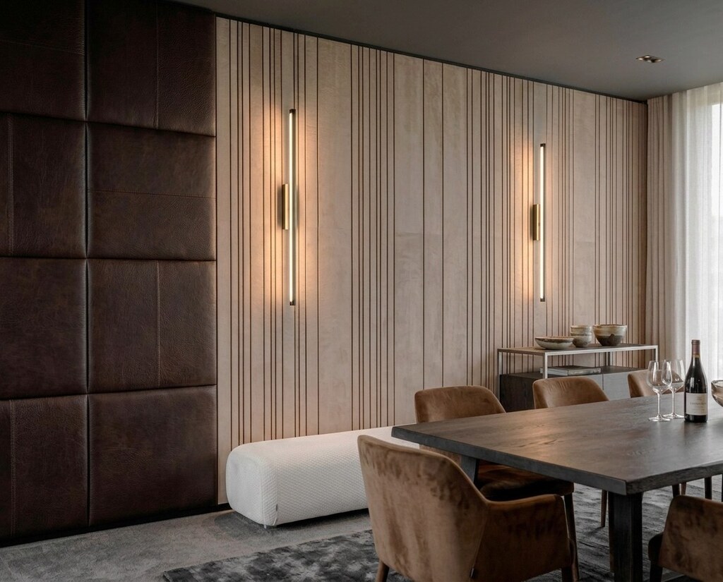 Brown leather panels combined with acoustic panels in light suede.