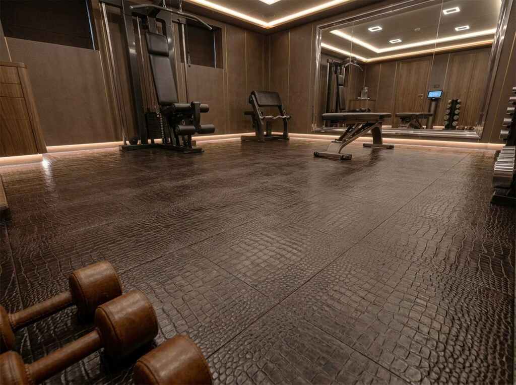 Home gym with caiman-embossed leather flooring.