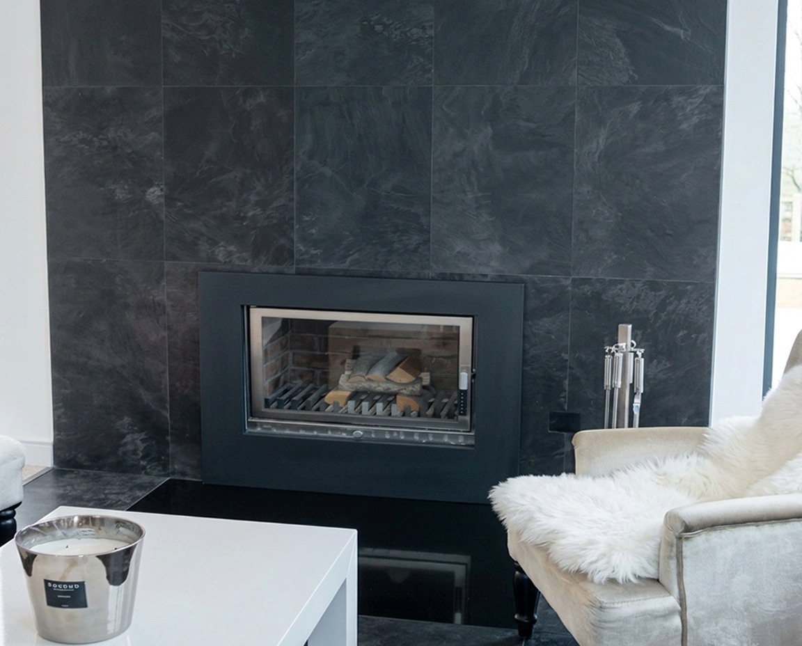 Leather-paneled fireplace.