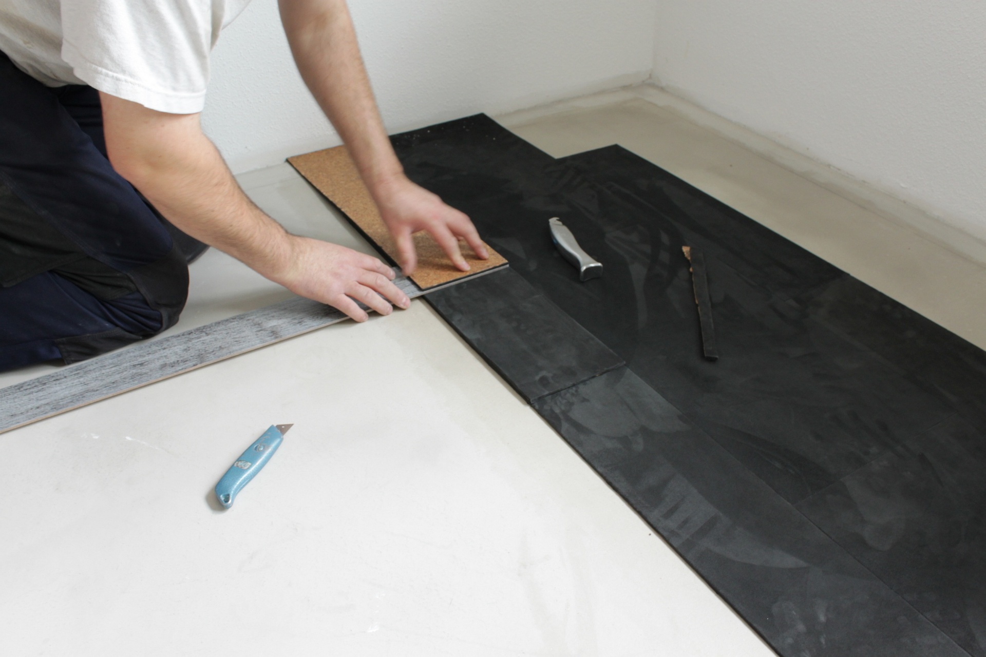 Flooring installation: Handcrafted black suede leather floor fitted by a master craftsman.