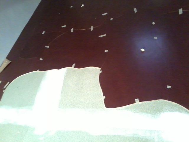 Substrate preparation for mosaic leather installation.